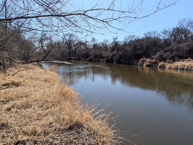 1433 Ridgeview Dr, Montevideo, MN 56265 - water view featuring a heavily wooded area