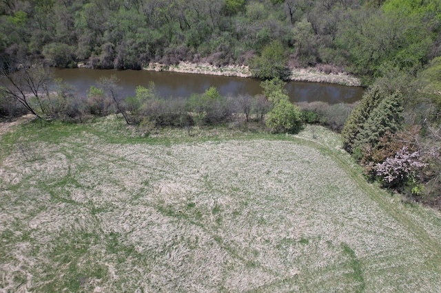 1433 Ridgeview Dr, Montevideo, MN 56265 - view of yard featuring a wooded view and a water view