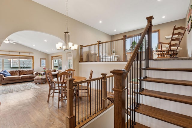 dining room featuring recessed lighting, lofted ceiling, and wood finished floors