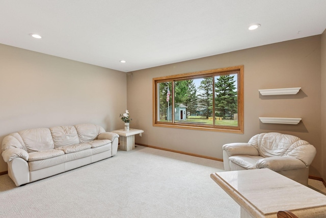 living room featuring recessed lighting, carpet floors, and baseboards
