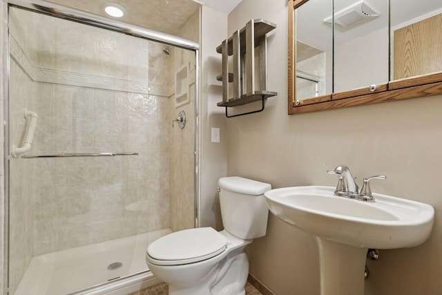 full bathroom with visible vents, a shower stall, and toilet