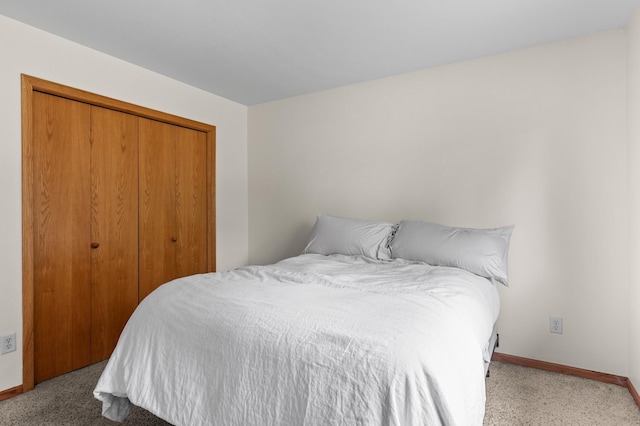 7051 Fox Rd, Baxter, MN 56425 - bedroom with carpet flooring, a closet, and baseboards