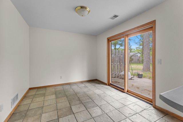 7051 Fox Rd, Baxter, MN 56425 - empty room featuring baseboards and light stone finish flooring