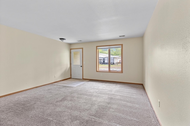 7051 Fox Rd, Baxter, MN 56425 - unfurnished room with light carpet and baseboards