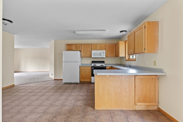 7051 Fox Rd, Baxter, MN 56425 - kitchen featuring white appliances, a sink, and baseboards