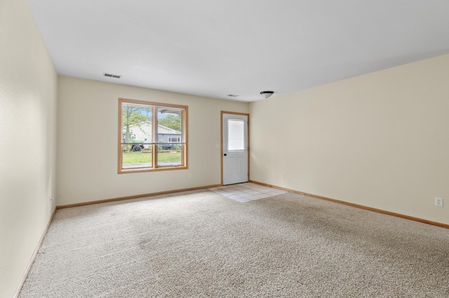 7051 Fox Rd, Baxter, MN 56425 - unfurnished room featuring light carpet and baseboards