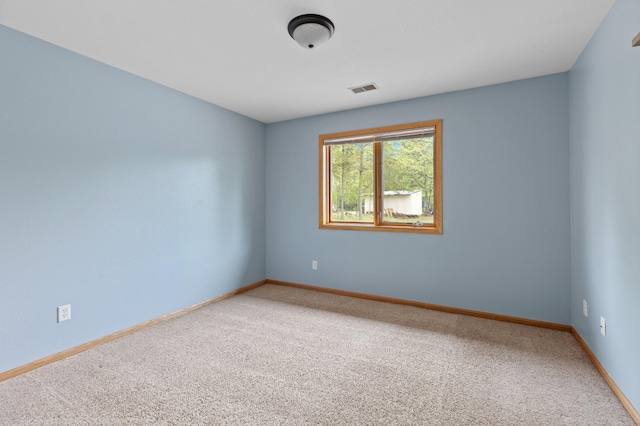 7051 Fox Rd, Baxter, MN 56425 - carpeted empty room featuring baseboards