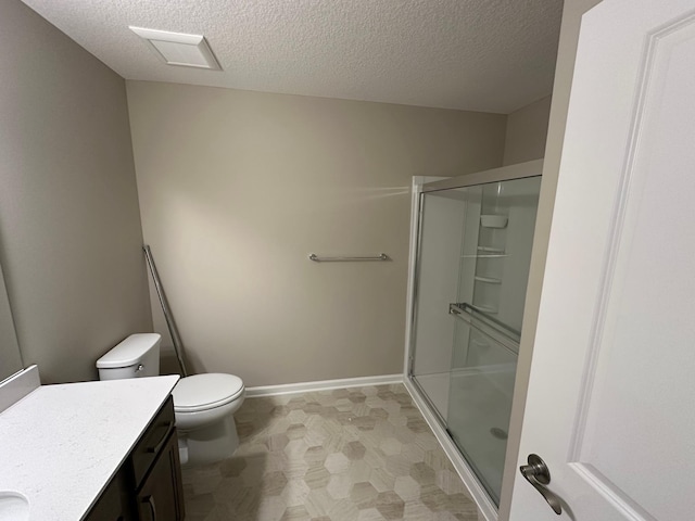 2063 Oakpointe Dr, Waconia, MN 55387 - full bath featuring vanity, a stall shower, and a textured ceiling