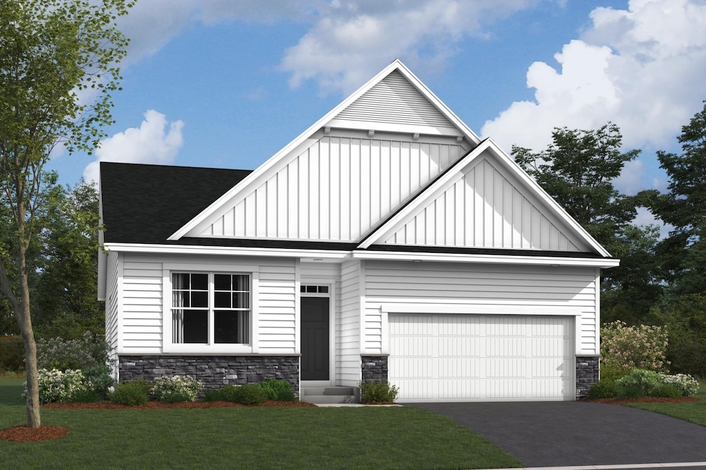 view of front of house with board and batten siding, a front yard, and stone siding
