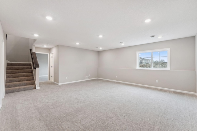 1274 Orchard Ct, Waconia, MN 55387 - below grade area with carpet floors, stairs, and recessed lighting