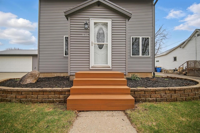 235 3rd St NE, Blooming Prairie, MN 55917 - view of front of house with driveway and a garage