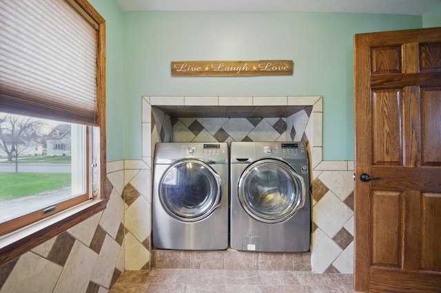 235 3rd St NE, Blooming Prairie, MN 55917 - laundry area featuring separate washer and dryer and laundry area