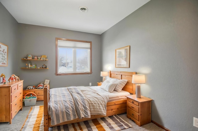235 3rd St NE, Blooming Prairie, MN 55917 - bedroom featuring light carpet and visible vents