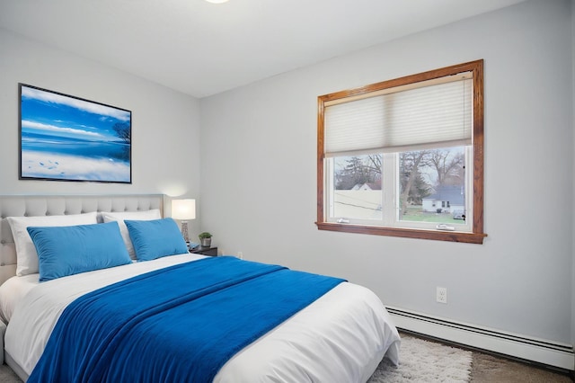 235 3rd St NE, Blooming Prairie, MN 55917 - bedroom with carpet floors and baseboard heating