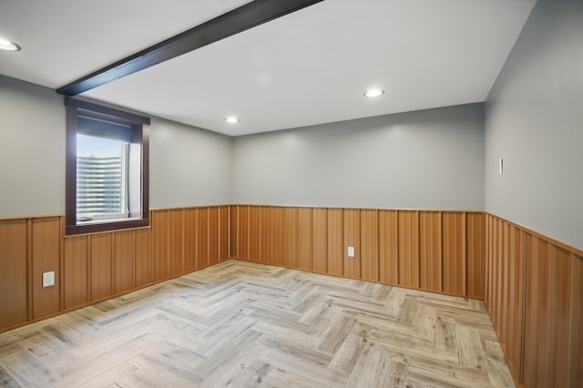 235 3rd St NE, Blooming Prairie, MN 55917 - unfurnished room with wainscoting, wooden walls, and recessed lighting