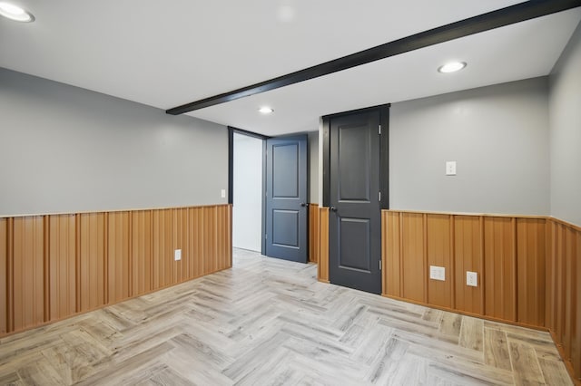 235 3rd St NE, Blooming Prairie, MN 55917 - finished below grade area featuring a wainscoted wall and recessed lighting