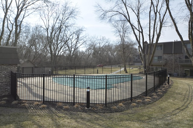 community pool with fence