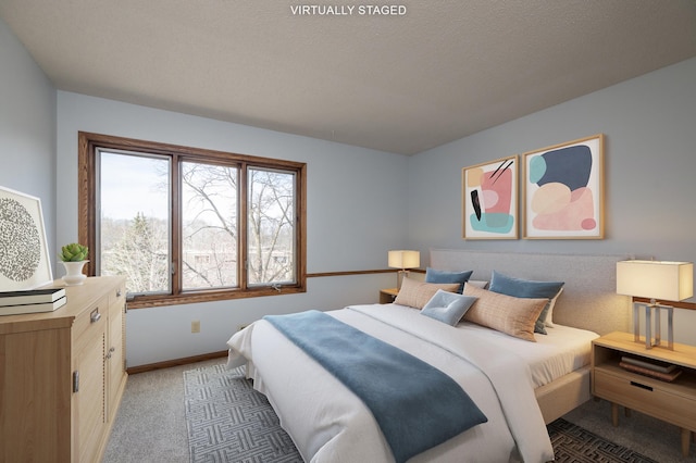 bedroom featuring light carpet and baseboards
