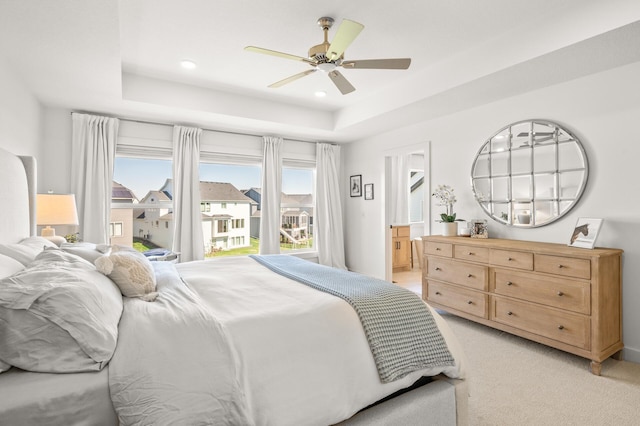 4429 Arbor Dr, Woodbury, MN 55129 - bedroom with a raised ceiling, light carpet, recessed lighting, a ceiling fan, and connected bathroom