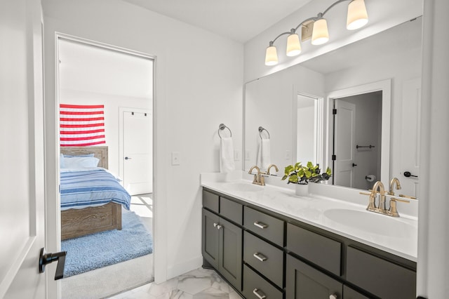 4429 Arbor Dr, Woodbury, MN 55129 - full bath with ensuite bathroom, double vanity, marble finish floors, and baseboards