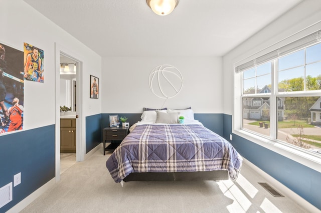 4429 Arbor Dr, Woodbury, MN 55129 - bedroom featuring light carpet and baseboards