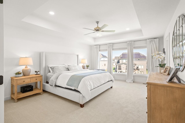 4429 Arbor Dr, Woodbury, MN 55129 - bedroom with a raised ceiling, light colored carpet, recessed lighting, and ceiling fan