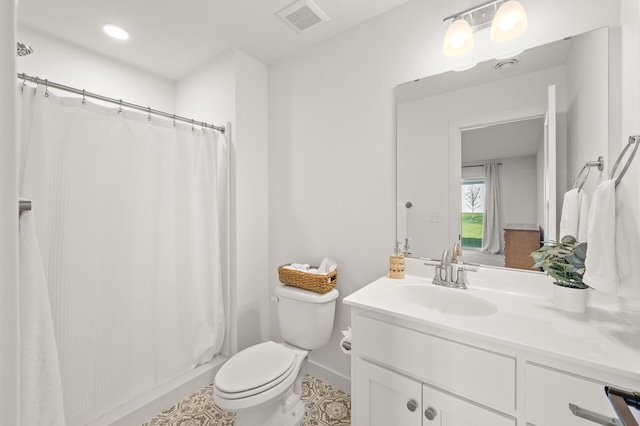 4429 Arbor Dr, Woodbury, MN 55129 - bathroom featuring vanity, toilet, baseboards, tile patterned flooring, and recessed lighting