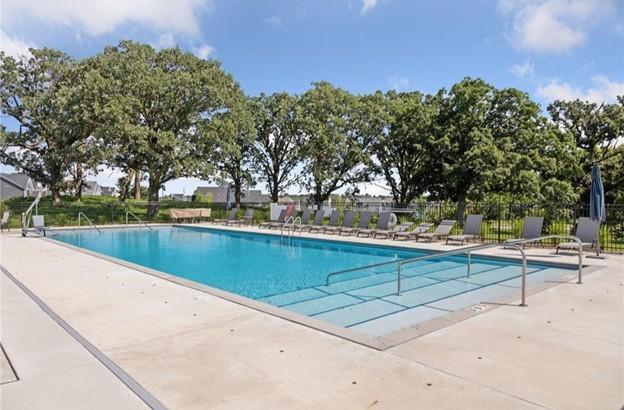 4429 Arbor Dr, Woodbury, MN 55129 - community pool featuring a patio