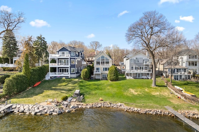 4101 Highwood Rd, Orono, MN 55364 - rear view of property with a lawn, a water view, a residential view, and a balcony
