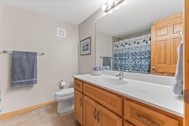 4101 Highwood Rd, Orono, MN 55364 - full bathroom featuring visible vents, tile patterned flooring, vanity, toilet, and a textured ceiling