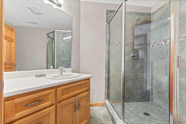 4101 Highwood Rd, Orono, MN 55364 - bathroom with vanity, tile patterned floors, and a stall shower
