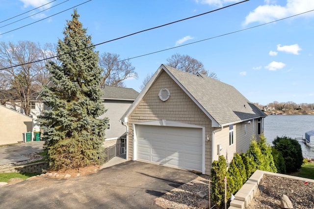 4101 Highwood Rd, Orono, MN 55364 - view of front of home featuring a shingled roof and driveway