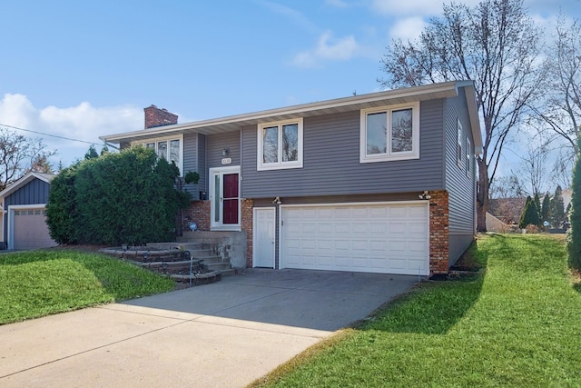 bi-level home featuring concrete driveway, an attached garage, a chimney, and a front lawn