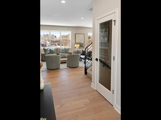 7881 Austin Way, Inver Grove Heights, MN 55077 - corridor featuring light wood finished floors, recessed lighting, and stairs
