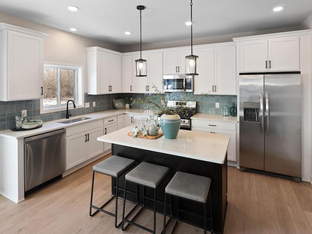 7881 Austin Way, Inver Grove Heights, MN 55077 - kitchen with stainless steel appliances, white cabinetry, and recessed lighting