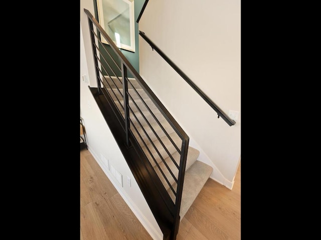 7881 Austin Way, Inver Grove Heights, MN 55077 - stairs with wood finished floors