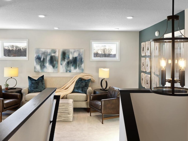 7881 Austin Way, Inver Grove Heights, MN 55077 - living area featuring light colored carpet, a textured ceiling, and recessed lighting