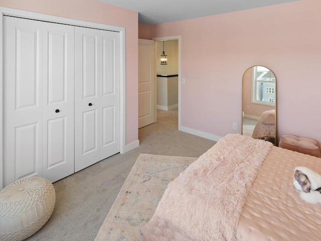 7881 Austin Way, Inver Grove Heights, MN 55077 - carpeted bedroom with a closet and baseboards