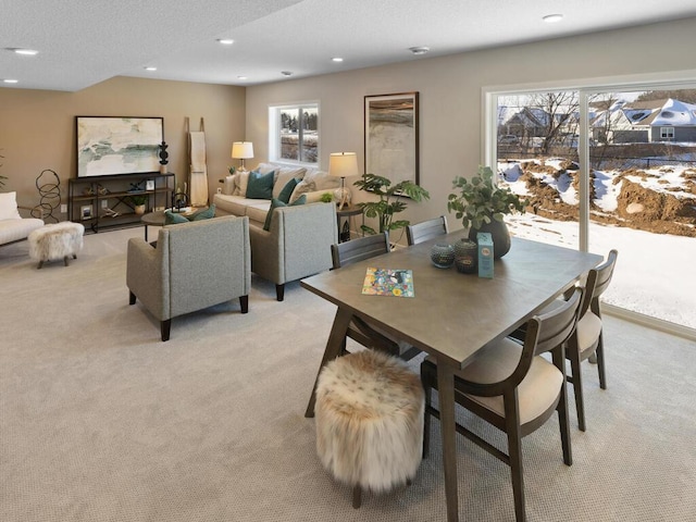 7881 Austin Way, Inver Grove Heights, MN 55077 - dining room with light colored carpet, healthy amount of natural light, recessed lighting, and a textured ceiling