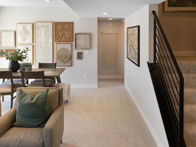 7881 Austin Way, Inver Grove Heights, MN 55077 - dining area featuring light colored carpet and stairway