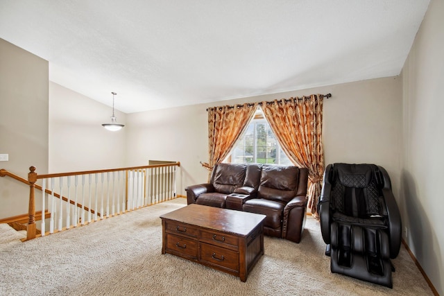 living room with baseboards, light carpet, and lofted ceiling