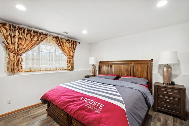 bedroom with recessed lighting, baseboards, and wood finished floors