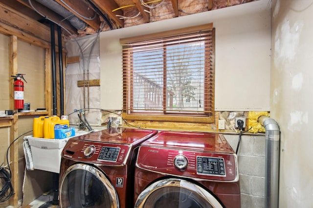 laundry area with laundry area and washing machine and dryer