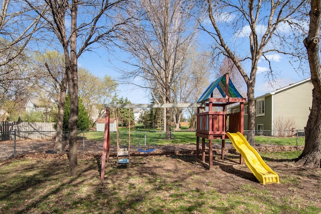 view of jungle gym featuring fence