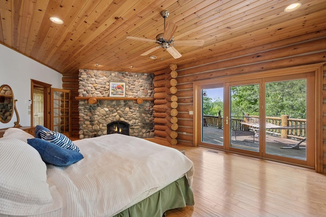 6070 Pilger Ave NW, Annandale, MN 55302 - bedroom featuring access to exterior, wood finished floors, rustic walls, wooden ceiling, and a stone fireplace