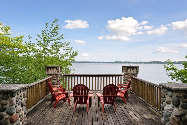 6070 Pilger Ave NW, Annandale, MN 55302 - wooden terrace featuring a water view
