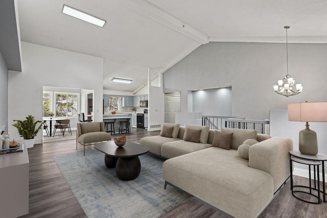 living area with beamed ceiling, dark wood-style floors, high vaulted ceiling, and a notable chandelier