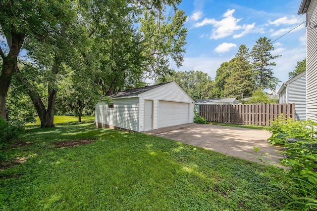 1759 Flandrau St, Maplewood, MN 55109 - view of yard featuring an outdoor structure and a detached garage