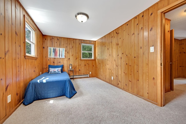 1759 Flandrau St, Maplewood, MN 55109 - unfurnished bedroom featuring a baseboard radiator, carpet, and wooden walls