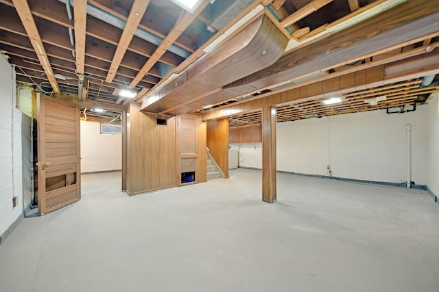1759 Flandrau St, Maplewood, MN 55109 - below grade area featuring washing machine and clothes dryer and stairs